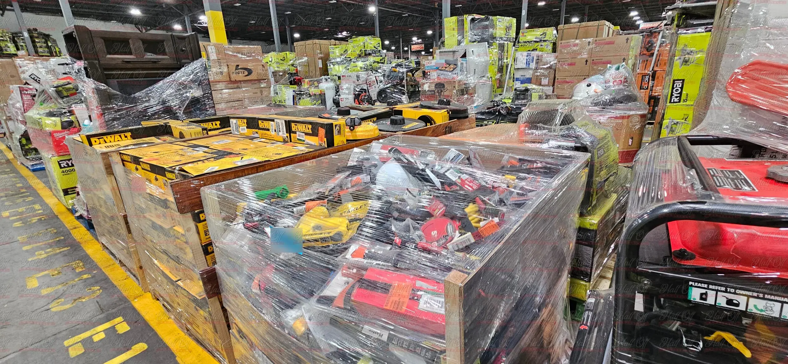 Warehouse aisle of tools and equipment pallets